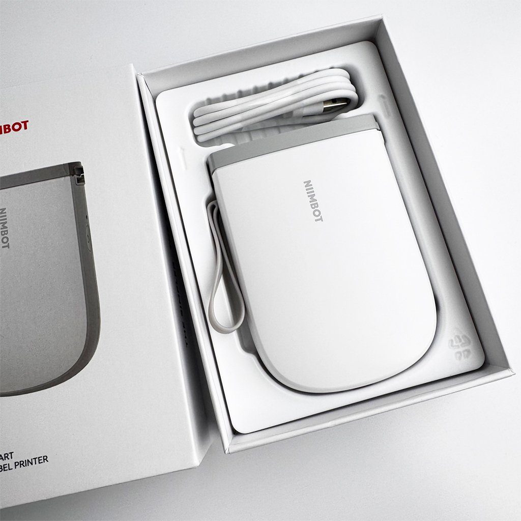 Термопринтер для друку наклейок NIIMBOT D11_H White (1AA57281601) 10